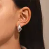 Pendientes de gota de agua retro de aleación transfronteriza europea y americana, estilo punk, sencillos, con forma de lágrima y coma para mujer.