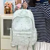 Nueva mochila de dibujos animados de estrellas linda transfronteriza para estudiantes de secundaria femeninas, alto valor estético, simple, ligera, de gran capacidad, con doble hombro