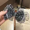 Estilo Coreano Primavera/Verano 2026 Nuevo Pinza para el Cabello de Lunares con Lazo Pinza de Tiburón Grande de Malla Dulce y a la Moda
