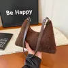 Bolso Tote Pequeño de Alta Gama de Moda para Mujer 2025 Nuevo Estilo con un Diseño de Hombro Casual Minimalista Elegante y Único