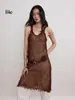 Vestido sin mangas de punto de lana suelta con dobladillo en línea A, textura y sensación de alta gama, con bordes de flecos calados
