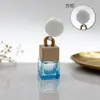 Venta al por mayor del fabricante 8ML botellas vacías cuadradas con tapa de colores, disponibles en todos los colores, botellas de vidrio para colgar en el coche, botellas de perfume de colores