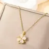 Giratório Girassol Colar Moda Feminina Luz Luxo Girassol Pingente Nicho Design Sense 18K Ouro Titânio Aço Clavícula Cadeia