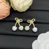 2025 Nuevo Modelo Huajia Versión de Alta Gama Pendientes en Forma de V con Diamantes Rojos Cereza para Mujer, Collar de Lazo de Lujo al por Mayor