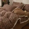 Juego de cuatro piezas de jacquard cepillado de algodón grueso para otoño e invierno, alta densidad, cálido, agradable para la piel, sábanas y fundas de edredón suaves