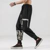 Primavera y Verano nuevo estilo chino pantalones casuales de algodón y lino para hombre pantalones de rábano de lino retro japonés cinturón bordado moda