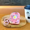 Llavero Creativo Lindo Máquina de Darle la Vuelta al Huevo Divertido Descompresión Juguete para Estudiantes Colgante Accesorios para Bolsas Regalos para Parejas Mayoreo