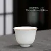 Venta al por mayor de una variedad de tazas de té individuales pequeñas y medianas de cerámica, taza de Celadón, taza de arena púrpura con relieve, cuenco de té para el hogar
