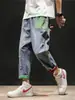 Jeans rasgados de moda para hombre con cintura elástica y cordón, corte recto holgado, estilo callejero americano, bolsillos de color en bloque geniales