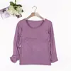 Otoño e invierno nuevos fabricantes al por mayor modal con copa acolchada en el pecho una sola talla color liso simple para mujer camisa base de manga larga