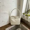 Bolso Cubo Sencillo de Color Sólido Bolso de Mano Casual Verano 2026 Nuevo Sensación Relajada Personalidad Nicho Tendencia Bolso de Hombro