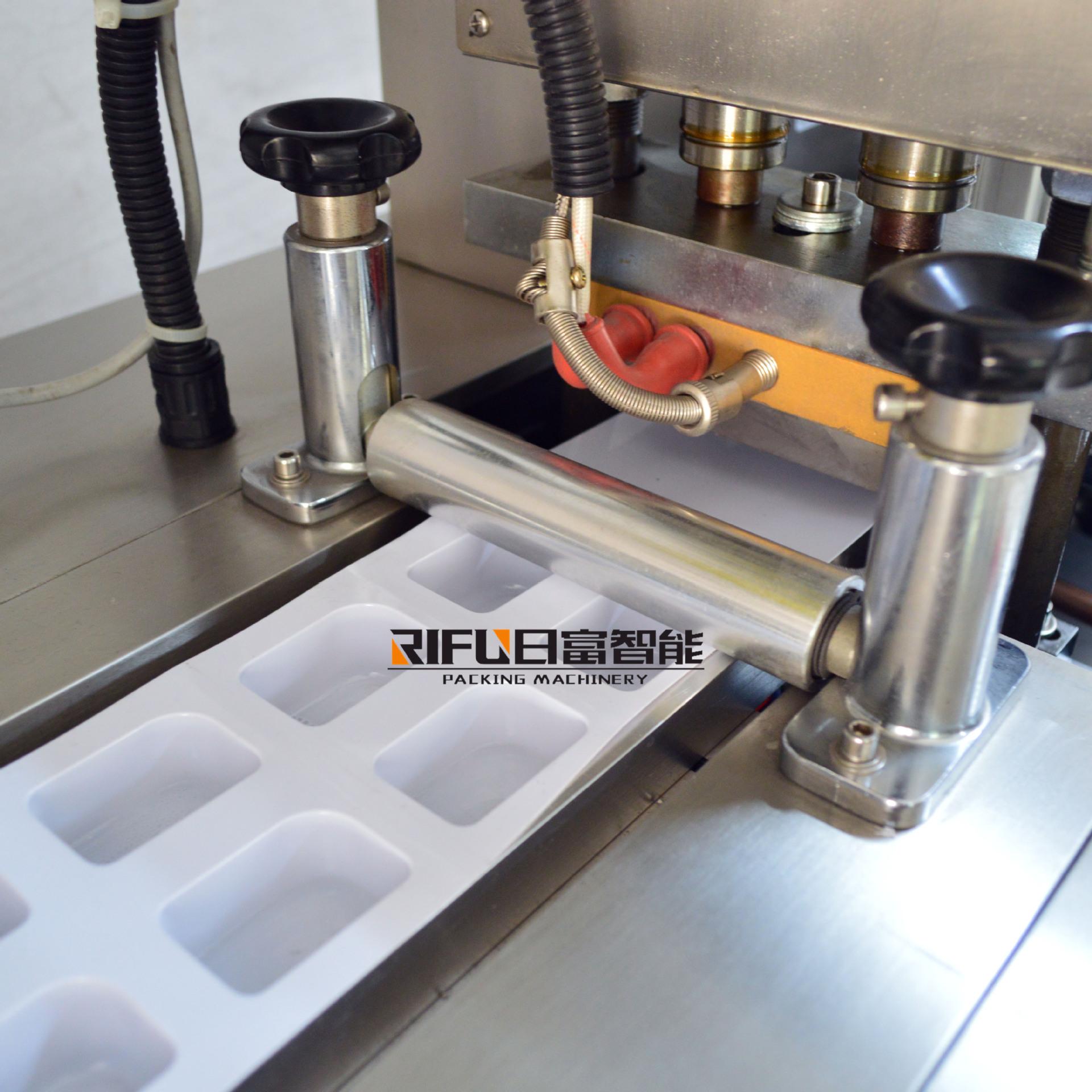 双头灌装泡罩机