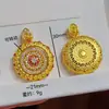 Pingente de Colar Bússola Tradicional de Oito Tesouros que Muda a Sorte, Novo Estilo Chinês, Rotativo, Oco Dourado com Areia, Versátil para Mulheres, Atacado