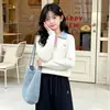 Tricô Outono Estilo College para Meninas 2026 Novo Estilo Crianças de Tamanho Médio e Grande Moda Blusa de Tricô Gola Polo Color Block Slim Fit