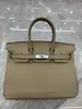 26 Modelos Nuevos de Bolsos de Cuero Genuino para Mujer con Hebilla Plateada, Bolso Platino, Piel de Vaca de Capa Superior con Patrón de Lichi 25cm/30cm Bolsos para Mujer, Venta al por Mayor desde el Fabricante