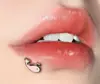 Aceite de Delfín Goteo Labios Uñas Rosa Blanco Rojo Tres Colores Nuevo Acero Inoxidable Recorte de Labios Espiral Interna Clavo de Hueso de Oreja Clavo de Oreja Perforación