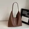 Bolsa Retrô de Grande Capacidade para Mulheres 2025 Moda Tendência Nova Bolsa de Ombro Simples Padrão Tricotado Casual para Trabalho