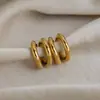 Puños Redondos Europeos y Americanos Clásicos de Doble Capa, Pendientes de Lujo Ligero, Joyería de Acero Inoxidable de Moda y Gama Alta al por Mayor