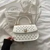 Bolsa de mão estilo western, nova para a primavera de 2026, bolsa quadrada pequena com alto valor estético, design com miçangas e elaborado, bolsa transversal