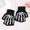Guantes sin dedos de calavera creativos de Halloween Garras de fantasma Transfronterizos Guantes de medio dedo para adultos Teclado Guantes de garra para dispensar