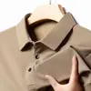 Nueva camiseta de manga larga para hombre con tejido gofrado, camisa polo casual de negocios de primavera con cuello desplegable, top base elástico
