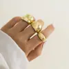 Europa y Estados Unidos joyería transfronteriza nicho sentido del diseño de moda geométrico anillo de arco anillo articulado anillo exagerado de apertura juego de anillos