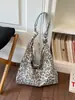 Bolso grande de leopardo para mujer, nuevo bolso de hombro retro de moda 2026, bolsa de mano para estudiantes para la escuela y el trabajo
