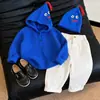 Roupas infantis coreanas coleção outono 2026: conjunto fofo de suéter azul com capuz, blusa de tricô e calça casual de corte reto