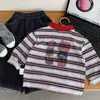 Camisa Polo Infantil 2026 Producto Nuevo de Otoño: Camiseta de Rayas para Niños y Niñas Jóvenes, Camiseta Base con Estampado de Oso de Moda, Moderna