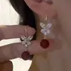 Corea del Sur diseño creativo mariposa pendientes exquisitos primavera y verano pequeños pendientes de temperamento fresco moda pendientes Joker venta al por mayor