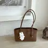 Bolso grande de alta moda retro estilo coreano para mujer, nuevo bolso de hombro casual para commuting 2026, bolso de mano tipo tote