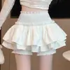 Falda elástica negra para mujer, nueva colección primavera/verano 2026, corte A, ajustada y acampanada, adecuada para figuras petite