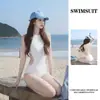 Traje de baño para mujer 2025 Nuevo de una pieza Secado rápido Adelgazante Estilo Lustre Puro Traje de baño para resort de playa aguas termales Venta al por mayor