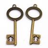 Yiwu fábrica de joyería stock colgante de llave de bronce DIY embalaje de regalo colgante tarjeta colgante