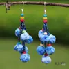 Pendientes de Teñido con Nudo de Yunnan Artístico Creativo Puesto Étnico Yunnan Dali Teñido con Nudo Tinte Azul Flor de Viaje Auricular Taibao