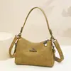 Bolsa de comércio exterior feminina 2025 novo modelo bolsa de mamãe versátil bolsa de ombro de grande capacidade couro macio bolsa tote multicamadas bolsa de axila