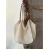 Bolsa de mano tejida de gran capacidad para mujer, estilo nuevo, casual y versátil, bolso de mano/bolso de hombro, adecuado para vacaciones en la playa, bolsa de punto calada
