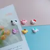 Novo desenho animado misto tamanho pequeno gelo através Sanrio acessórios de resina DIY cola creme capa de celular acessórios para grampo de cabelo