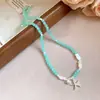 Pendientes y Collares de Estrellas de Mar con Cuentas Dopamina Primavera y Verano, Cadena para Clavícula Estilo Vacaciones en la Costa, Accesorios de Lujo Ligero de Alta Gama a la Moda