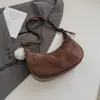 Comercio exterior transfronterizo diseño retro de nicho bolsa de empanadilla 2026 nueva moda de alto valor bolsa de cuerno bolso de hombro cruzado