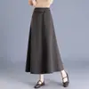 Falda de lana elegante de color liso para mujer, nuevo modelo otoño/invierno 2026, de cintura alta, falda línea A adelgazante con caída, que cubre la cadera, falda de dobladillo amplio
