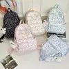 Nova mochila feminina estilosa, doce e artística, fofa, mochila de viagem leve para estudantes do ensino fundamental