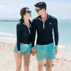 Traje de buceo Corea del Sur pareja femenina manga larga traje de baño medusa cremallera dividida protección solar traje de snorkel adelgazante