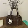 Nova Bolsa de Ombro Único Outono 2026 Versão Coreana Simples Retrô Bolsa de Axila Feminina Casual Tendência Moda Bolsa para o Dia a Dia