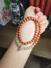 En vivo popular Qingshan Dai Lingyin fragancia a leche sándalo Hetian anillo corredizo pulsera de doble anillo estilo nacional simple estilo pareja de jade