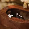 Brincos Borboleta Vazados de Camada Dupla para Mulheres Prata Esterlina S999 Estilo K Fecho de Rosca Torcido Brincos de Prata Pura Doce de Nicho de Alta Qualidade