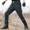 Pantalones de entrenamiento negros al por mayor de fábrica pantalones de entrenamiento de seguridad pantalones de camuflaje para exteriores pantalones tácticos pantalones de trabajo multibolsillo para hombre y mujer