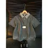 Camiseta de Verano 2026 para Hombre de Marca de Moda, Rayas, Cuello Polo, Manga Corta, Nuevo Diseño Holgado, Pareja, Media Manga