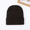 Sombrero de Punto de Color Puro para Exteriores con Protección para las Orejas, Cálido Sombrero Pullover para Hombre, Venta al por Mayor de Acrílico, Tablero de Luz, Sombrero de Lana para Mujer, Stock Listo