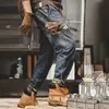 Pantalones vaqueros retro de estilo americano de Hong Kong, de peso pesado, holgados, rectos, de marca, de trabajo, de pierna ancha, informales, con acabado de piedra.